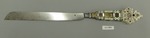 Tranchiermesser
1./2 Teilen eines Tranchierbestecks mit Heften von Stein und Elfenbein