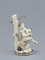 Statuette eines sitzenden Dudelsackpfeifers